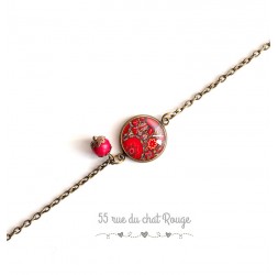 Bracelete cadena fina, flores rojas cabujón, inspiración hindú, bronce