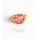 round cabochon ring, arabesque shape red and pink, paisley, golden finish