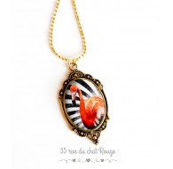 Collier pendentif Flamant rose, chaine dorée
